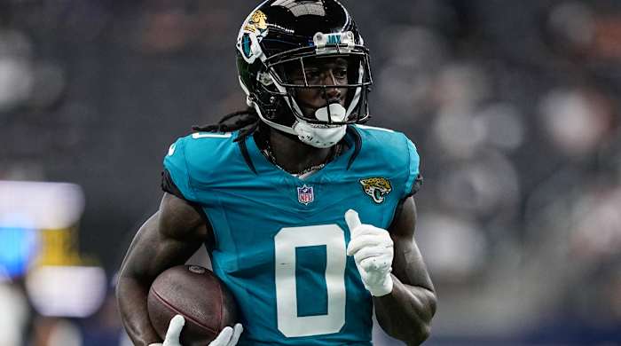 Jacksonville Jaguars wide receiver Calvin Ridley (0) runs drills before an NFL preseason football game against the Dallas Cowboys, Saturday, Aug. 12, 2023, in Arlington, Texas. (AP Photo/Tony Gutierrez)